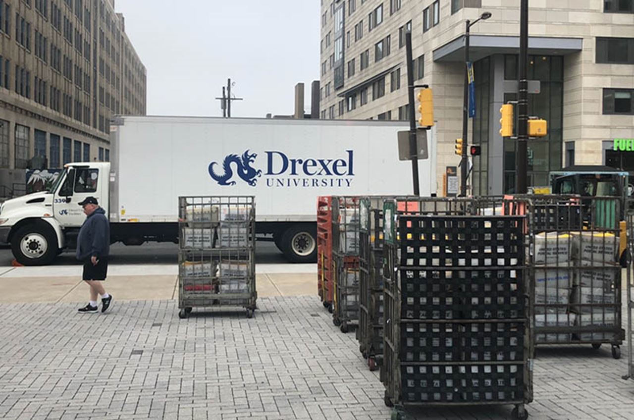 Trucks preparing to mail out the New Student Admission Letters as the University was closing on March 20. Photo credit: Mary K. Catalfamo.