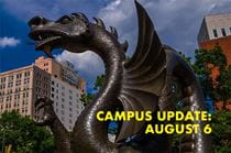 Dragon statue with Campus Update August 6