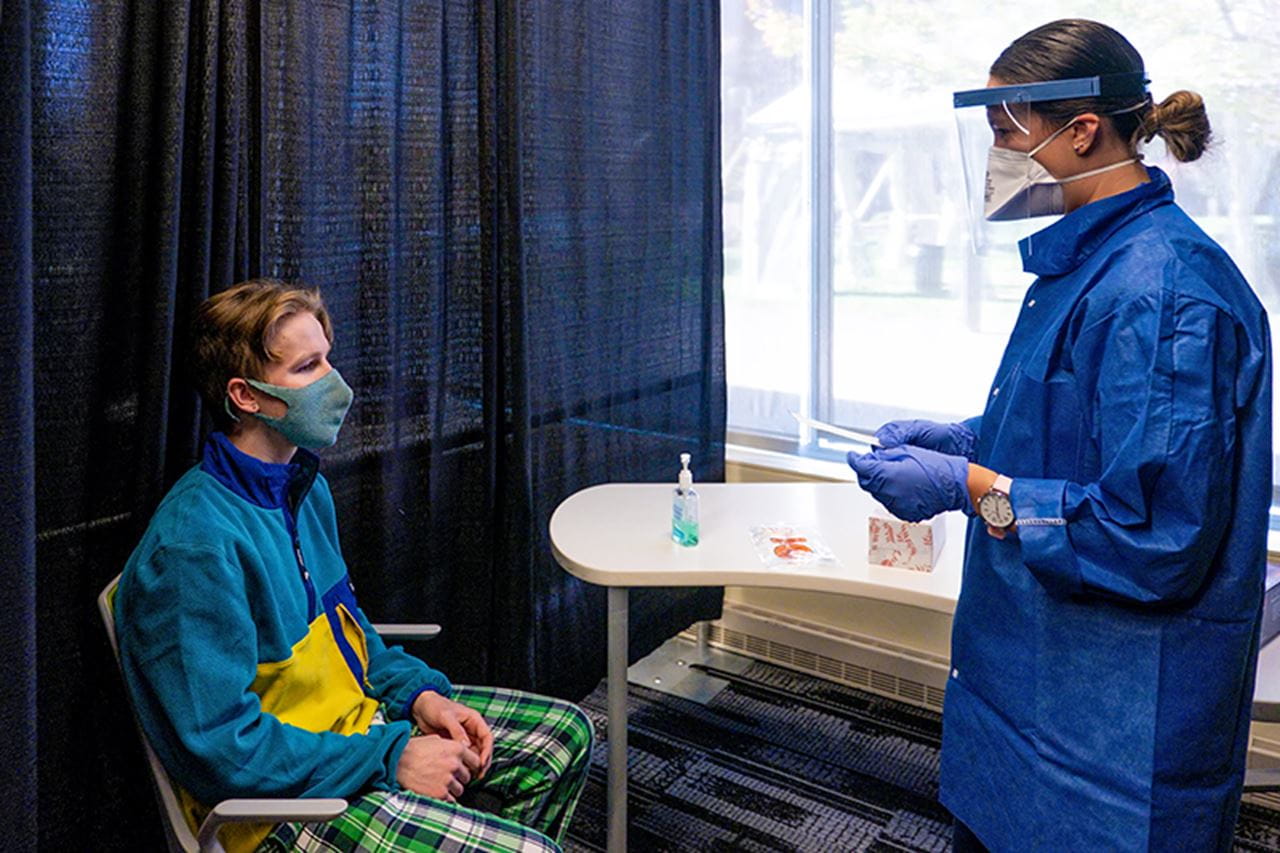 A Drexel student receives a COVID-19 test in the week leading up to Thanksgiving. The testing operation at Race Hall administered up to 500 tests per day in the week and the Monday before Thanksgiving, and saw a total of less than 1 percent positive cases. Photo by Jeff Fusco.