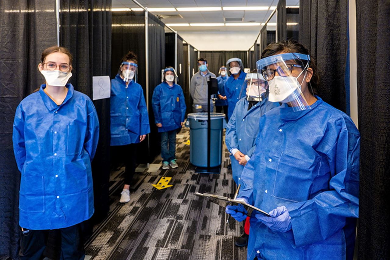 From administering COVID tests to conducting case investigation and contact tracing, the University has relied on a cross-college battalion of faculty, professional staff and students to protect Dragons against the coronavirus, and in turn, protect the surrounding community. Photo by Jeff Fusco.