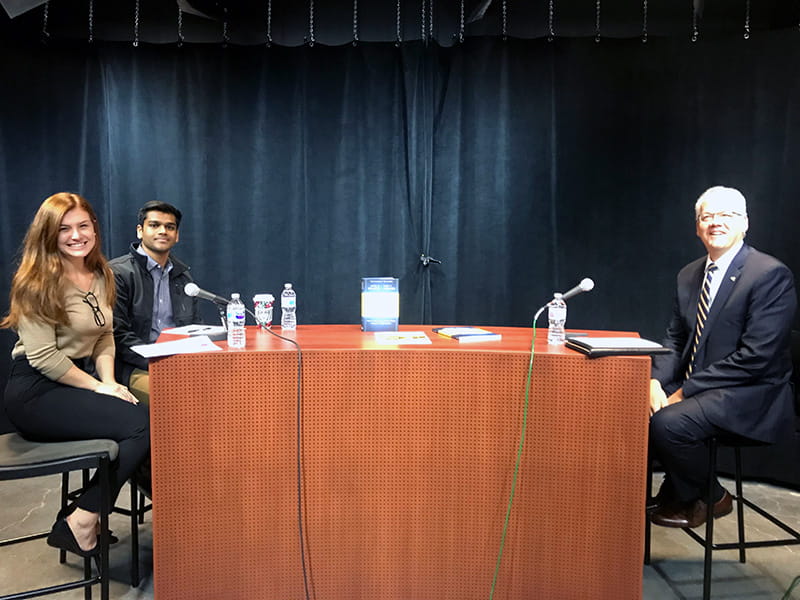 Rajeev Nunna, a third-year finance major, and Bella Santosusso, a fourth-year economics and legal studies major at Drexel University interviewing Interim Provost Paul Jensen, PhD, in the inaugural episode of the student-run “LeBow Students Talk Leadership” podcast. 