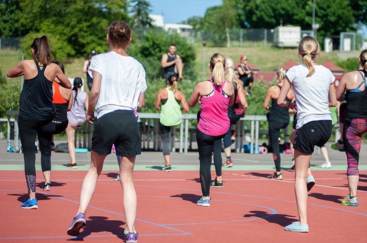 Group of women exercising outdoors