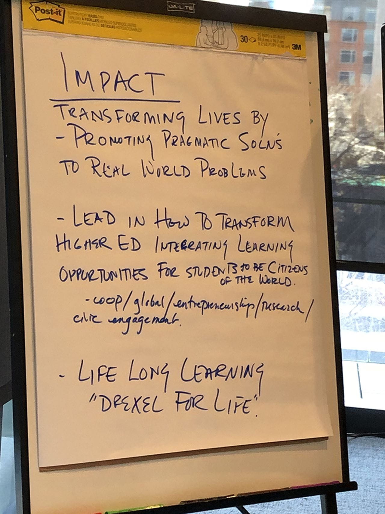 A poster showing some of the planning from the Executive Planning Committee's day-long retreat.