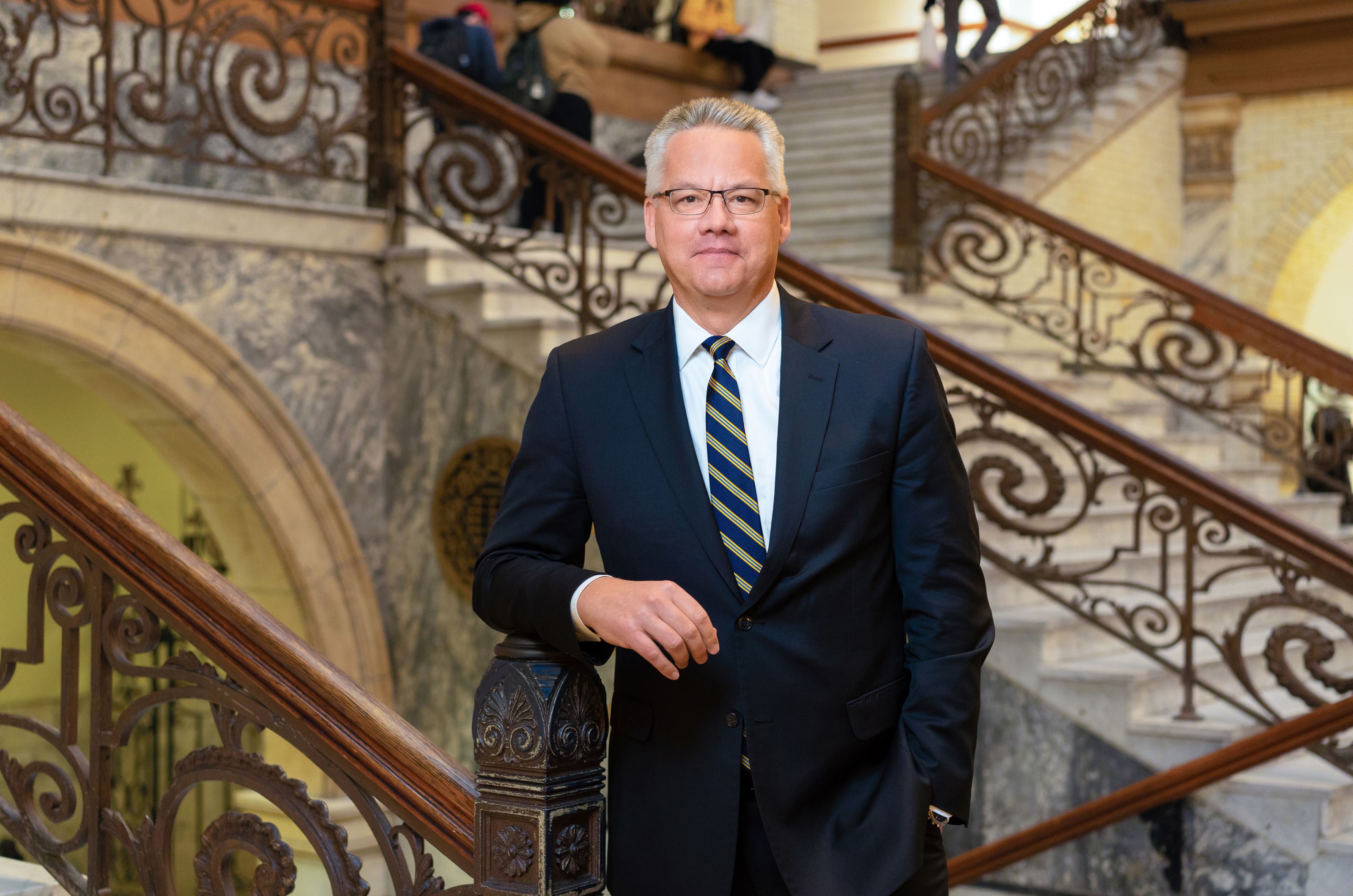 Provost Paul Jensen standing in the Great Court of the Main Building
