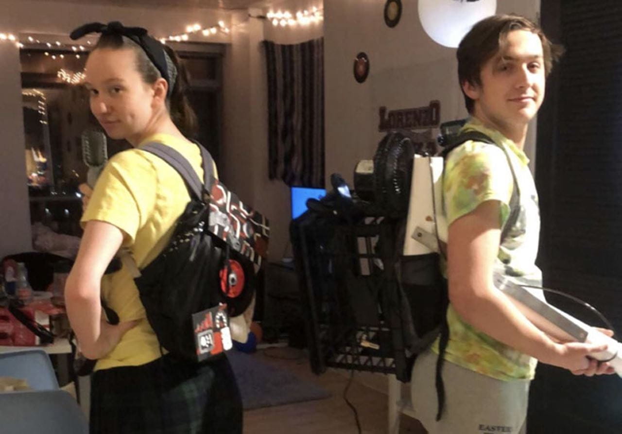 Entertainment and arts management student Lyndsey Connolly and architecture major Aaron Forsman model the Proton Packs they made for the “Theatre Production” course taught by Mandell Theater Technical Director Chris Totora.