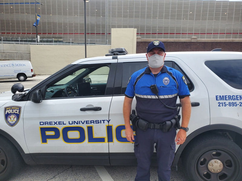 Officer Freeman demonstrating mask etiquette.