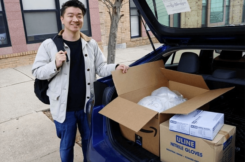 Third-year medical student Edward Guo after collecting PPE supplies. Photo courtesy Estefania Alba-Rodriguez and Kira Smith. 