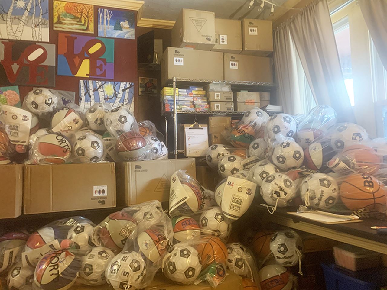 Sports equipment stored in Jeffrey Jordan's house to be distributed through Jeffrey's Porch. Photo courtesy Jeffrey Jordan.