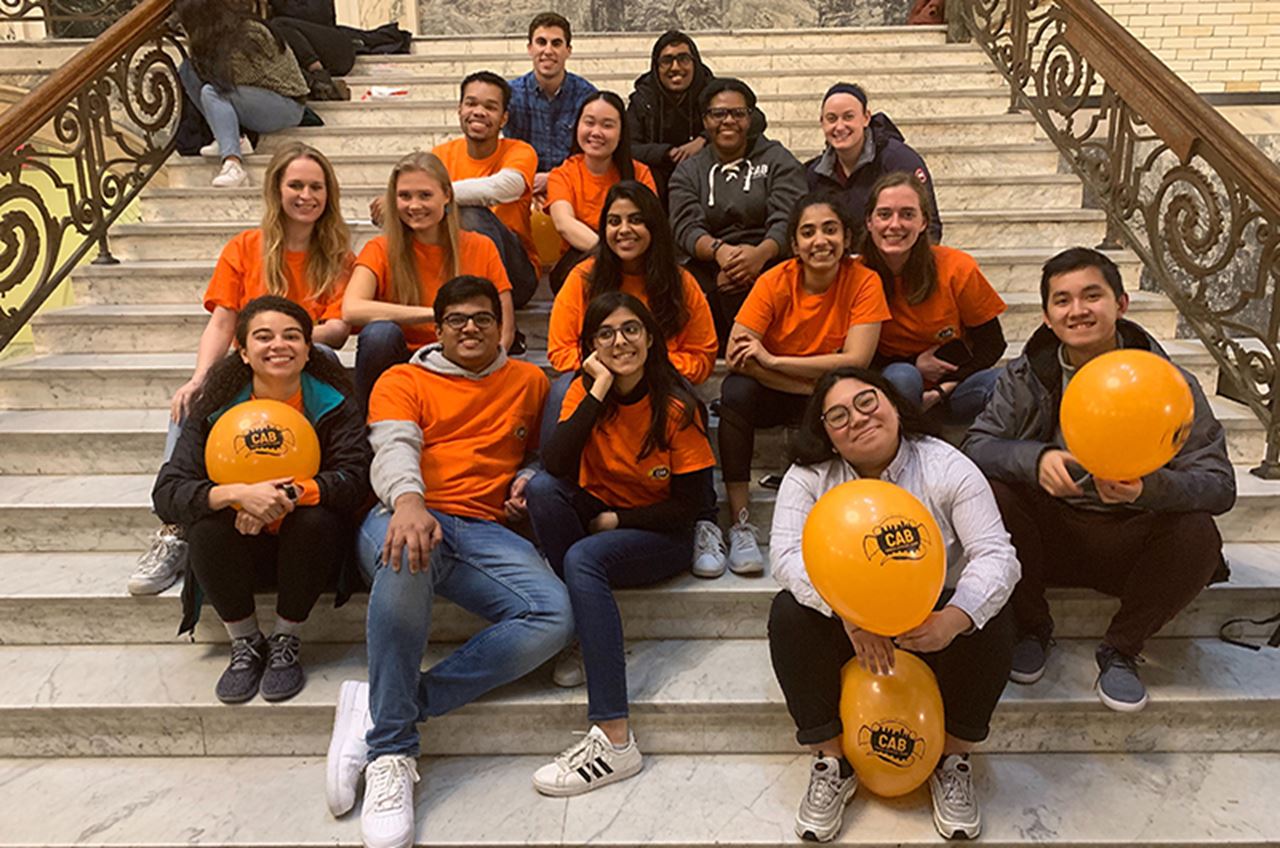 Members of Campus Activities Board (CAB) posing in Drexel University's Main Building.