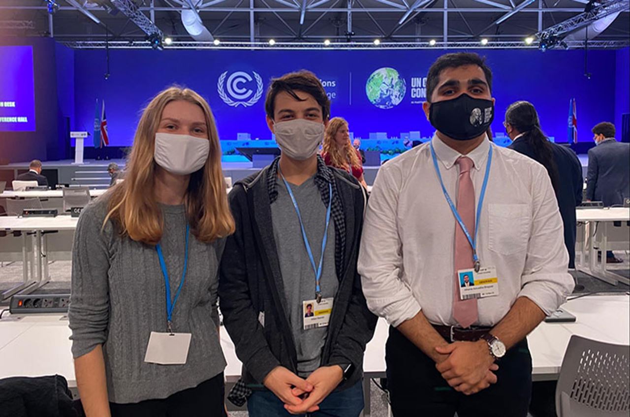 From left to right: Drexel students Sarah Wetzel, William Newman and Atharva Bhagwat. “This is inside the Plenary, a large room where the delegates from each country and organization gathered for the high-level events. Barack Obama also gave a speech in here a few days prior, which Sarah and I were able to attend,” Newman said. Photo courtesy William Newman.