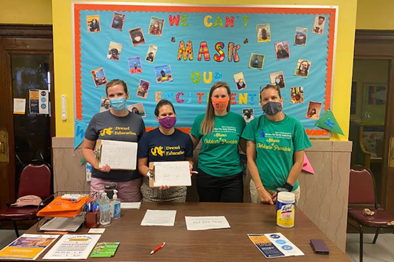 Left to right: Katie Mathew, Andrea DiMola, Cory Johnson and Maria Walker. Photo courtesy Office of University and Community Partnerships. 