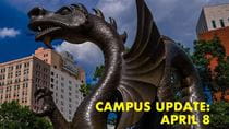 Dragon statue with the words campus update April 8