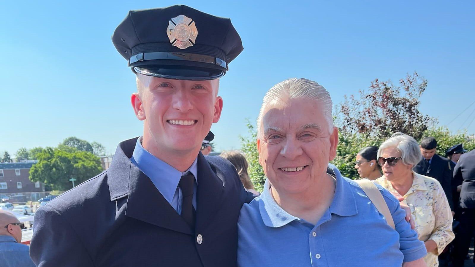 Interim Vice President Bob Lis (right) and his grandson, Jonathan Gowland, at his Philadelphia Fire Department graduation ceremony.