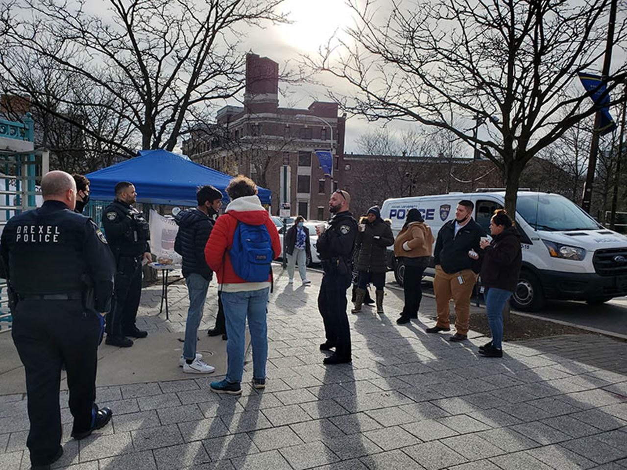 Drexel community members and DPS enjoying last month’s Cocoa With Cops.