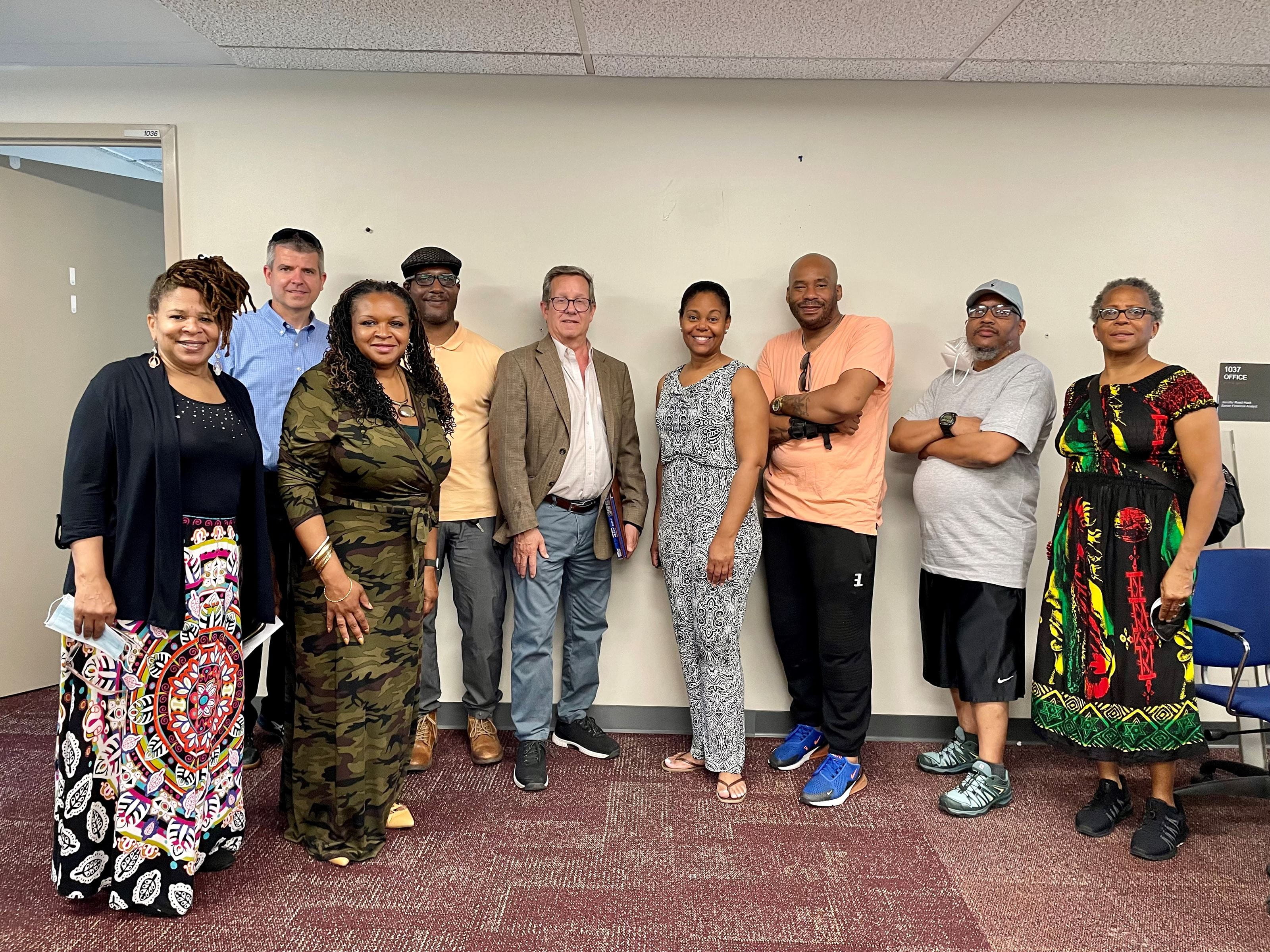 Members of Drexel University stand with community partners. 