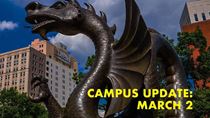 Dragon statue with the words campus update March 2