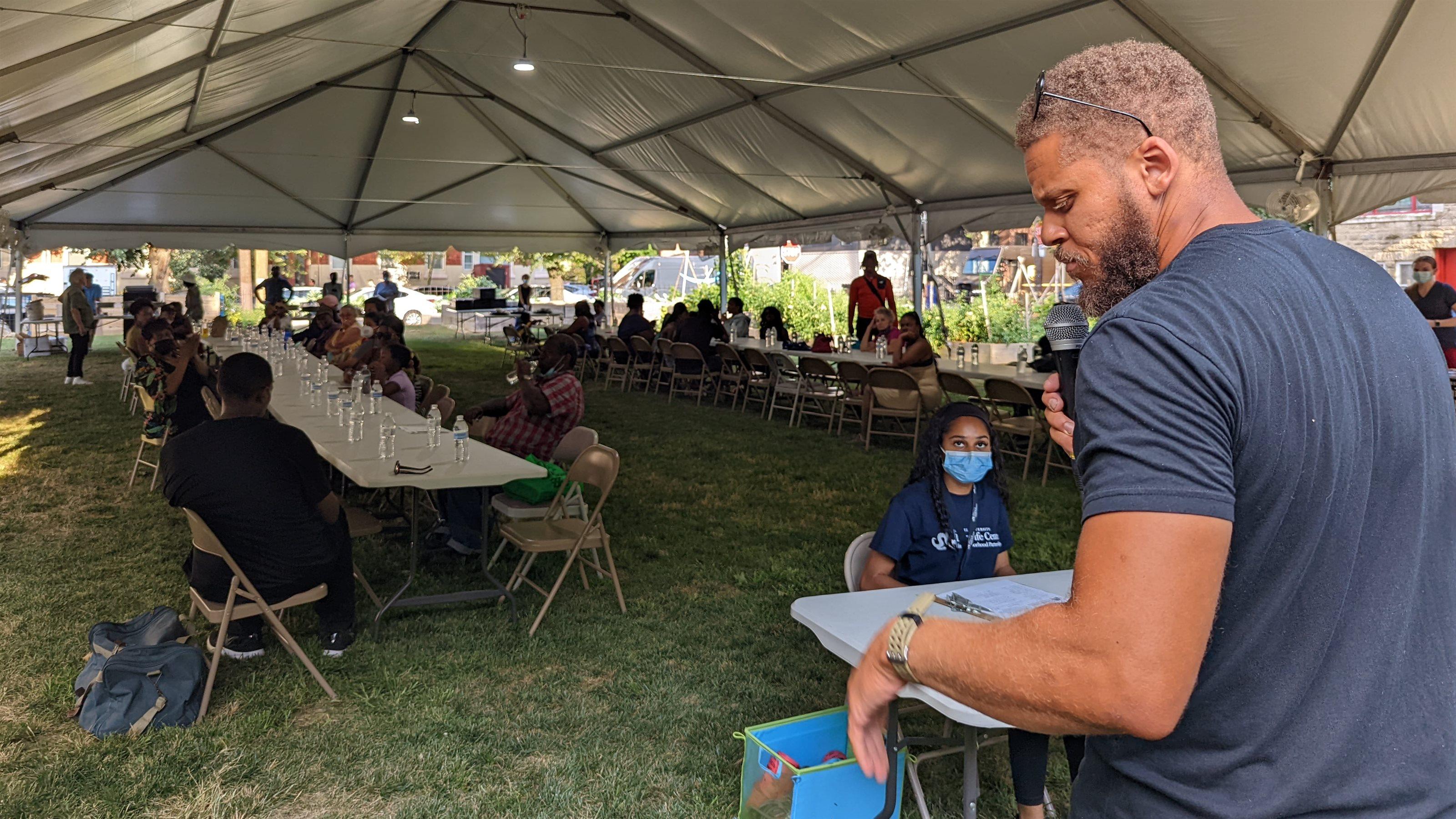 Daniel Lee in the tent for the dinner.