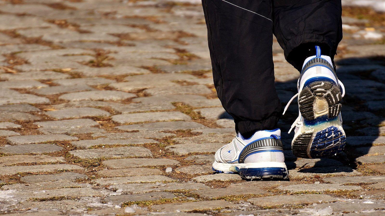 Close up photo of sneakers walking