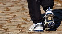 Close up photo of sneakers walking
