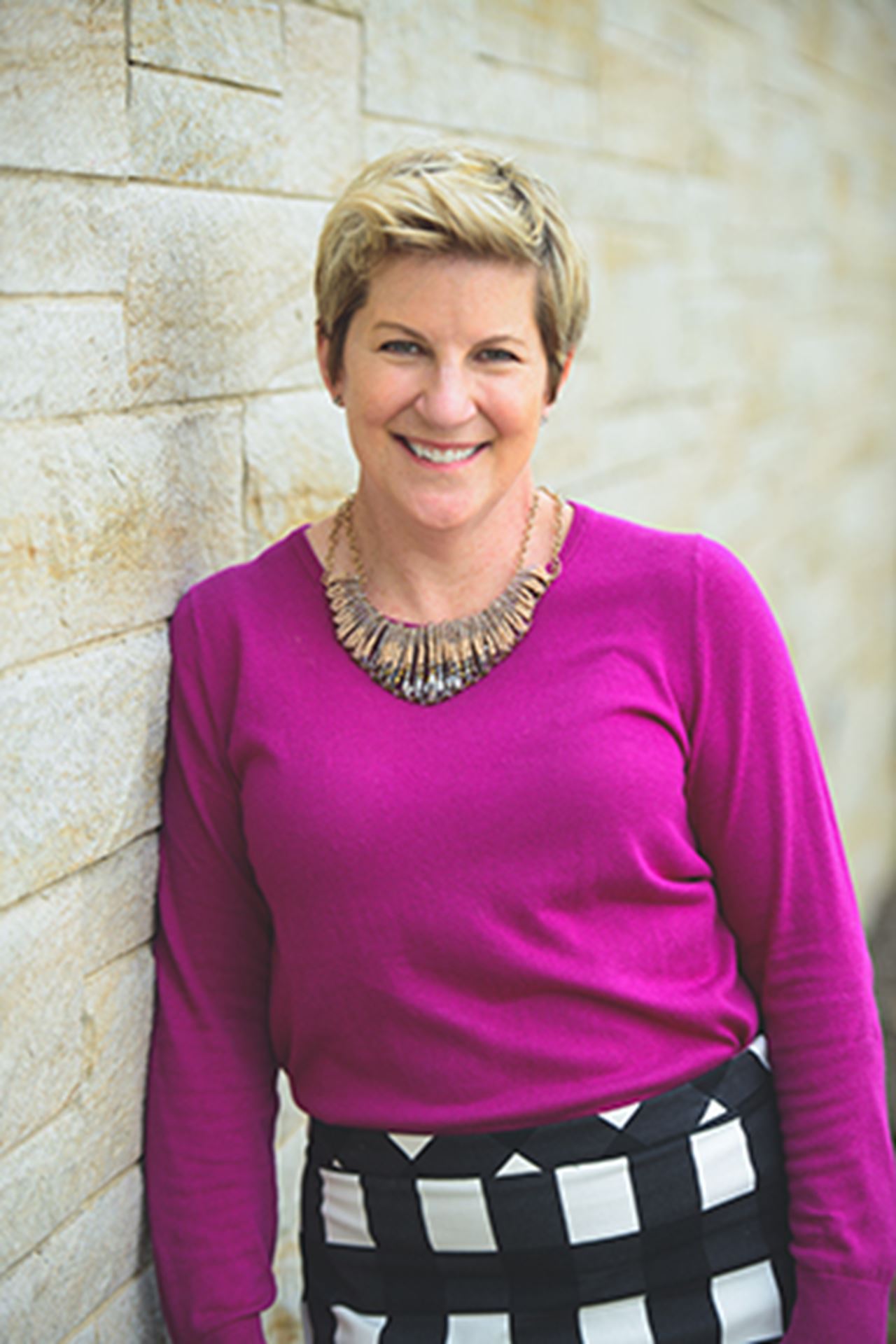 A headshot of Tracy Powell.