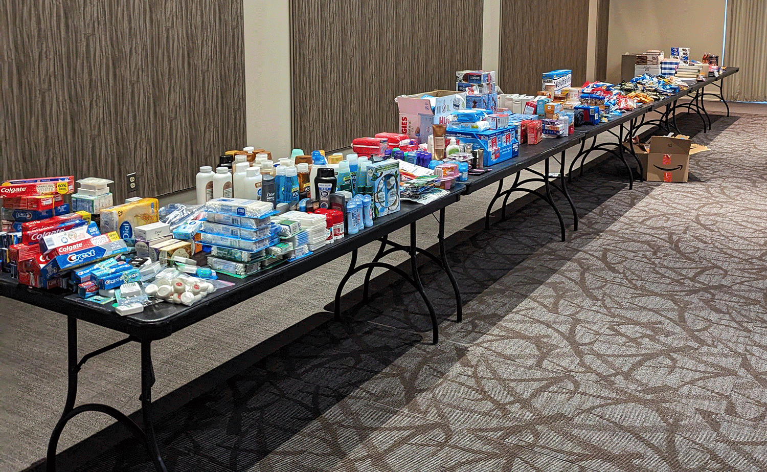 Gif of photos of two men donating items and a table with donated items.