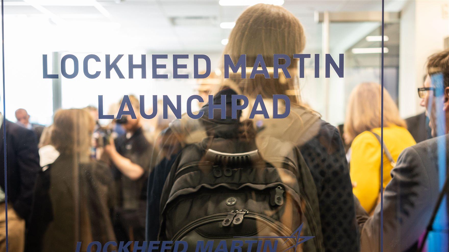 View of the Lockheed Martin Launchpad filled with people.