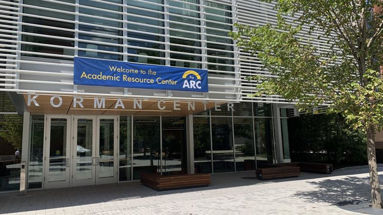 Sign reading Welcome to the Academic Resource Center on the Korman Center building