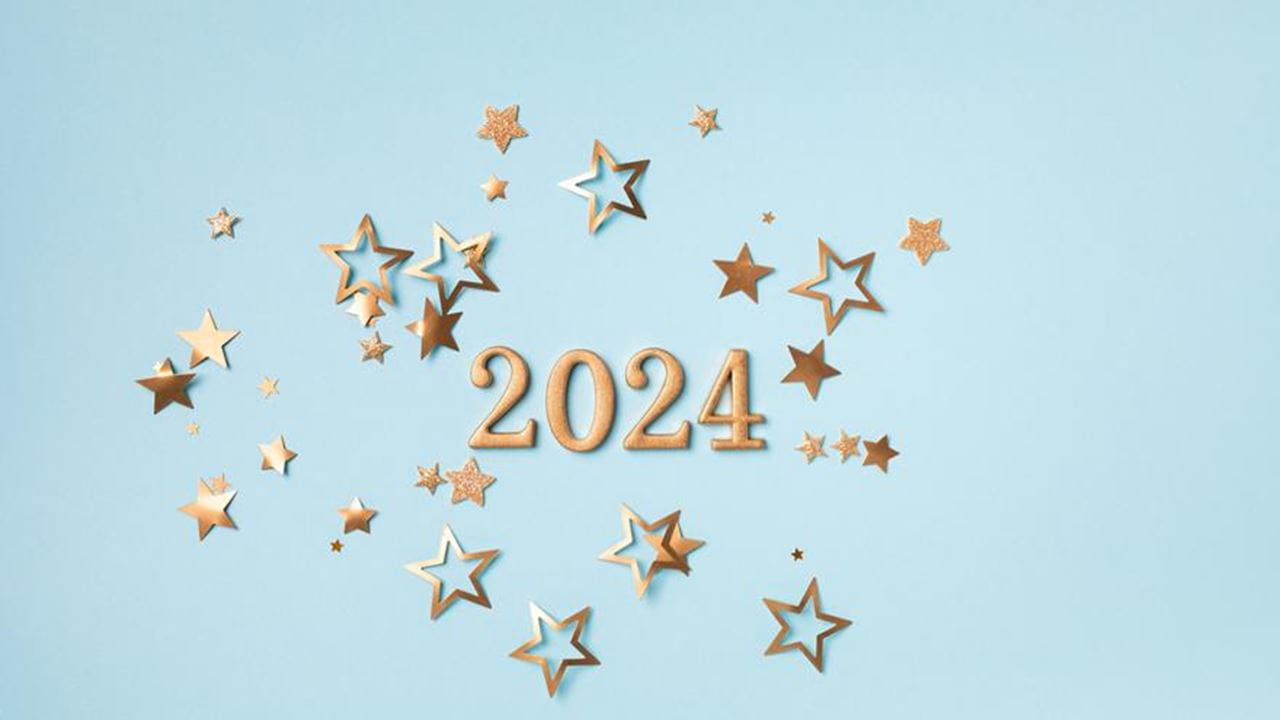 2024 in gold with stars around the numbers.