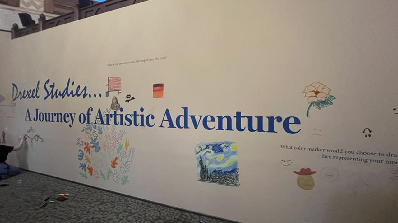 Some of the artworks drawn by visitors at the "Drexel Studies" opening.