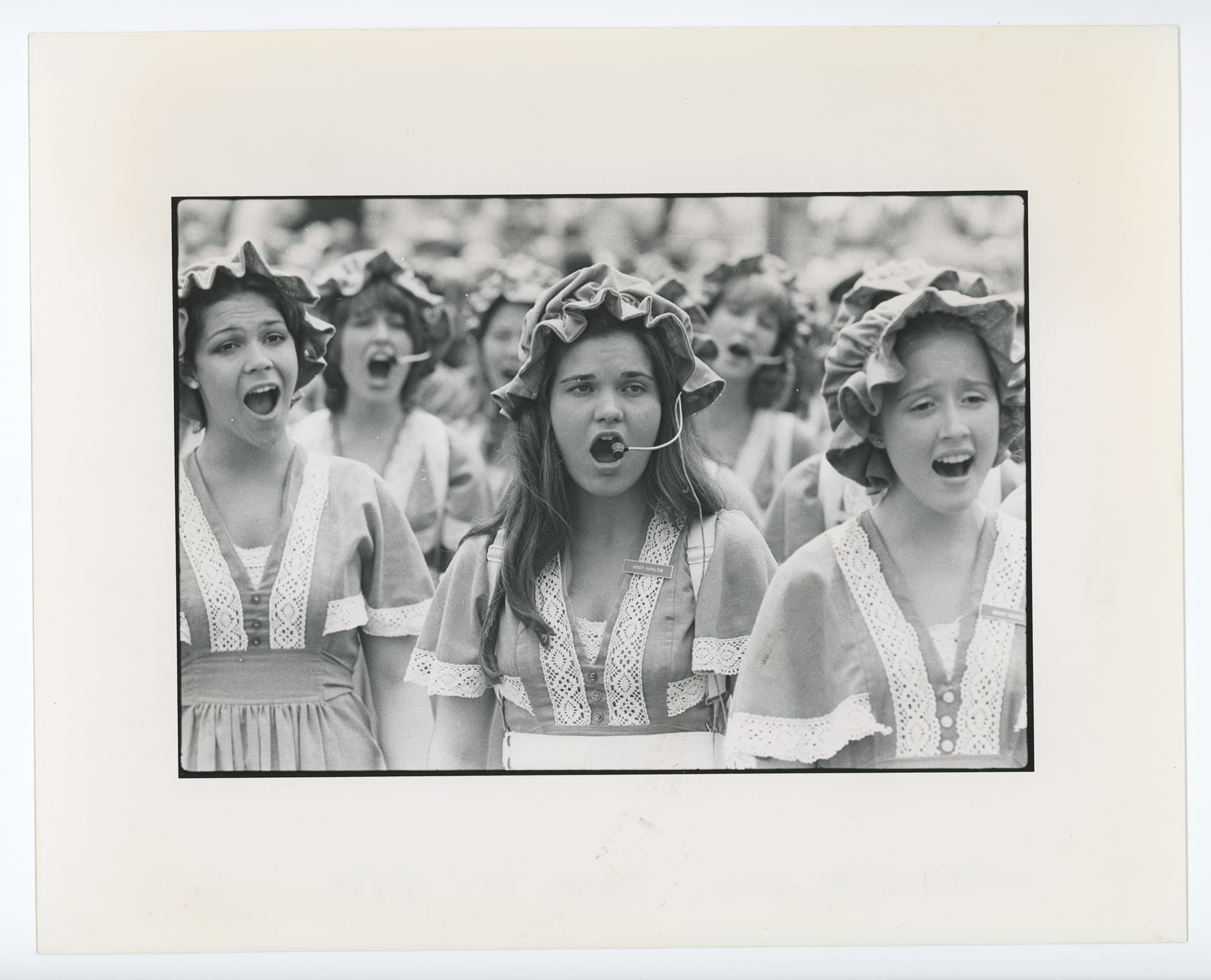 The female singers in this photograph dressed in colonial-era costumes (minus the microphone headsets) to sing at a Bicentennial celebration at Independence Hall on July 4, 1976.  