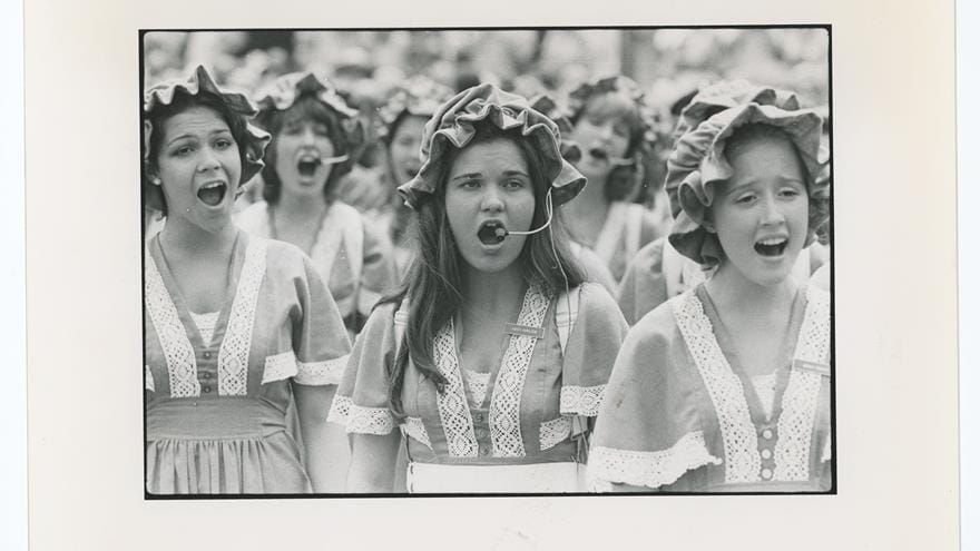 The female singers in this photograph dressed in colonial-era costumes (minus the microphone headsets) to sing at a Bicentennial celebration at Independence Hall on July 4, 1976.  