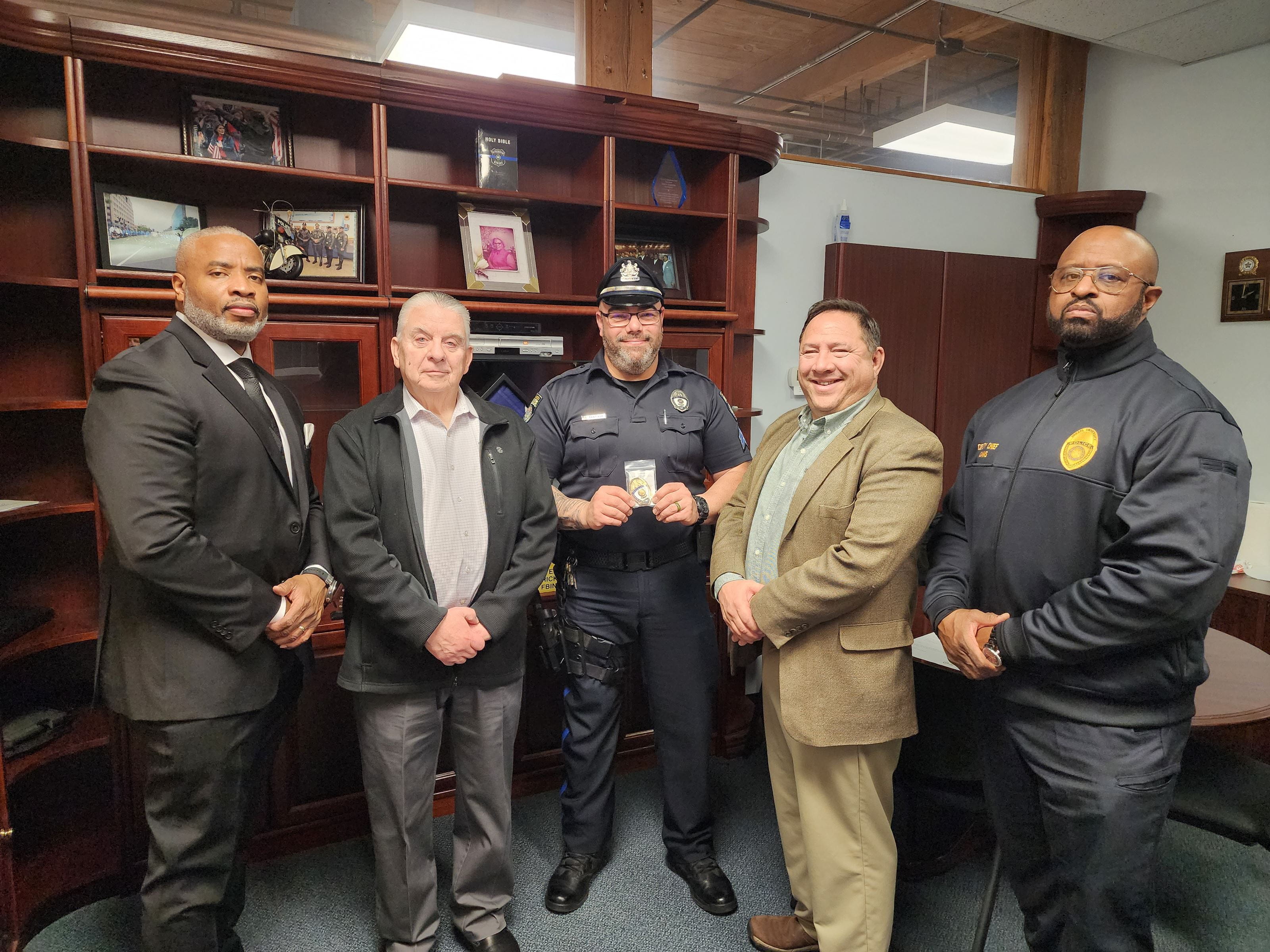 A room full of Drexel Public Safety officials in a row.