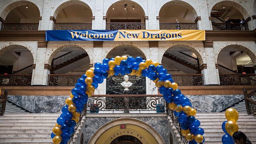 Drexel&#39;s Great Court with balloons and a sign reading &quot;Welcome New Dragons&quot;