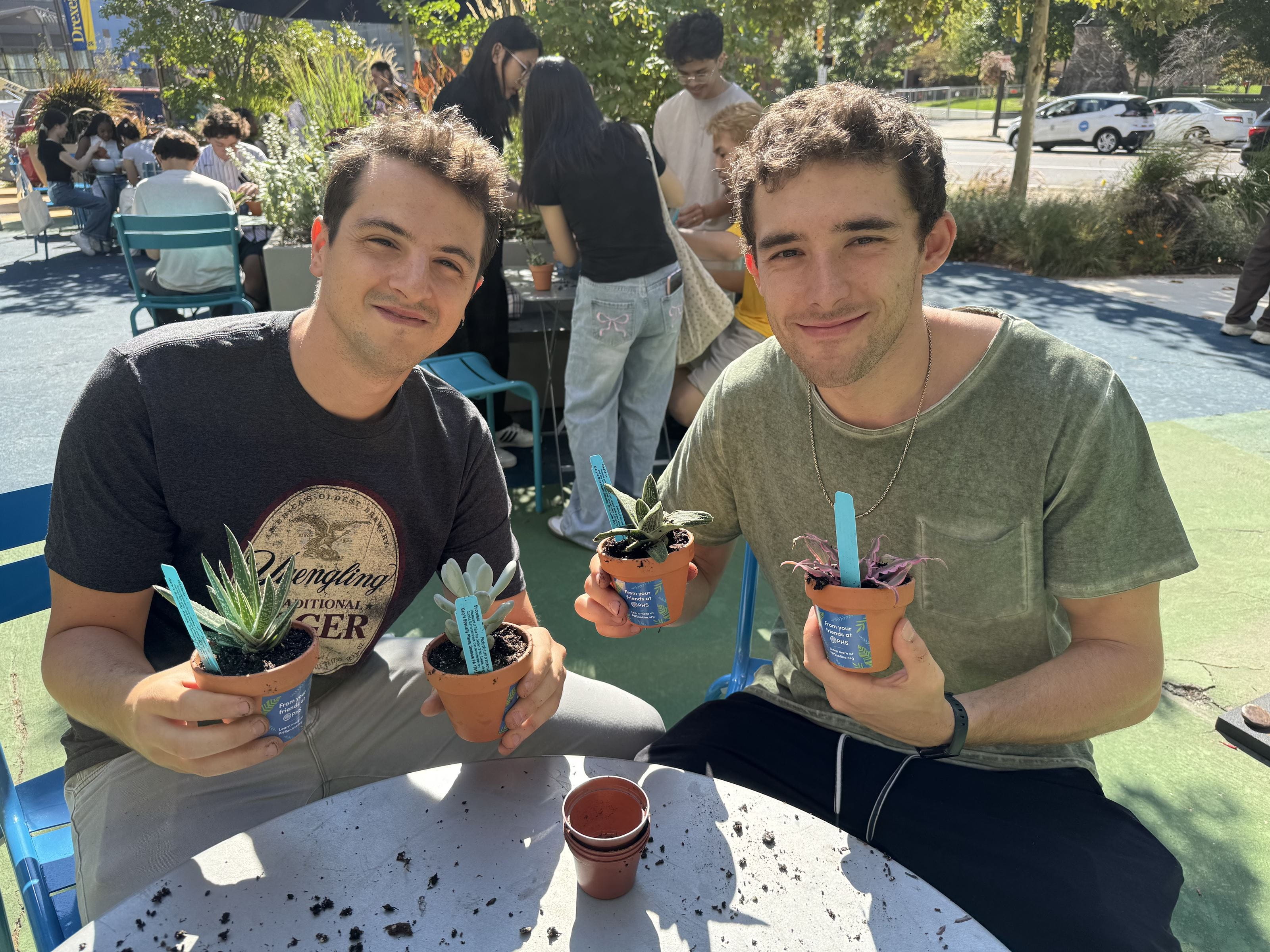 Students with free plants at Gateway Garden
