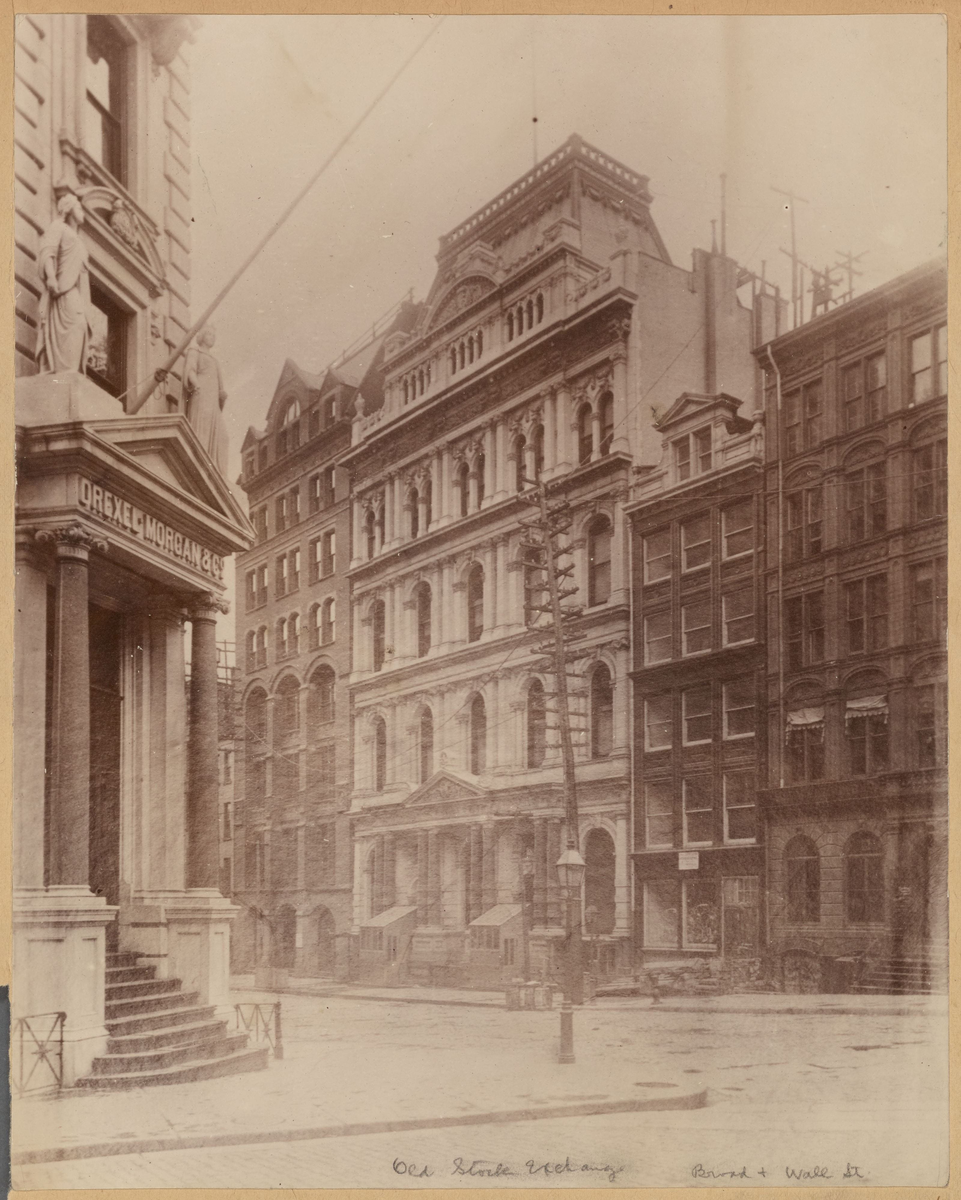 A late 19th century photograph showing the Drexel Building on Wall Street. Photo courtesy the New York Public Library.