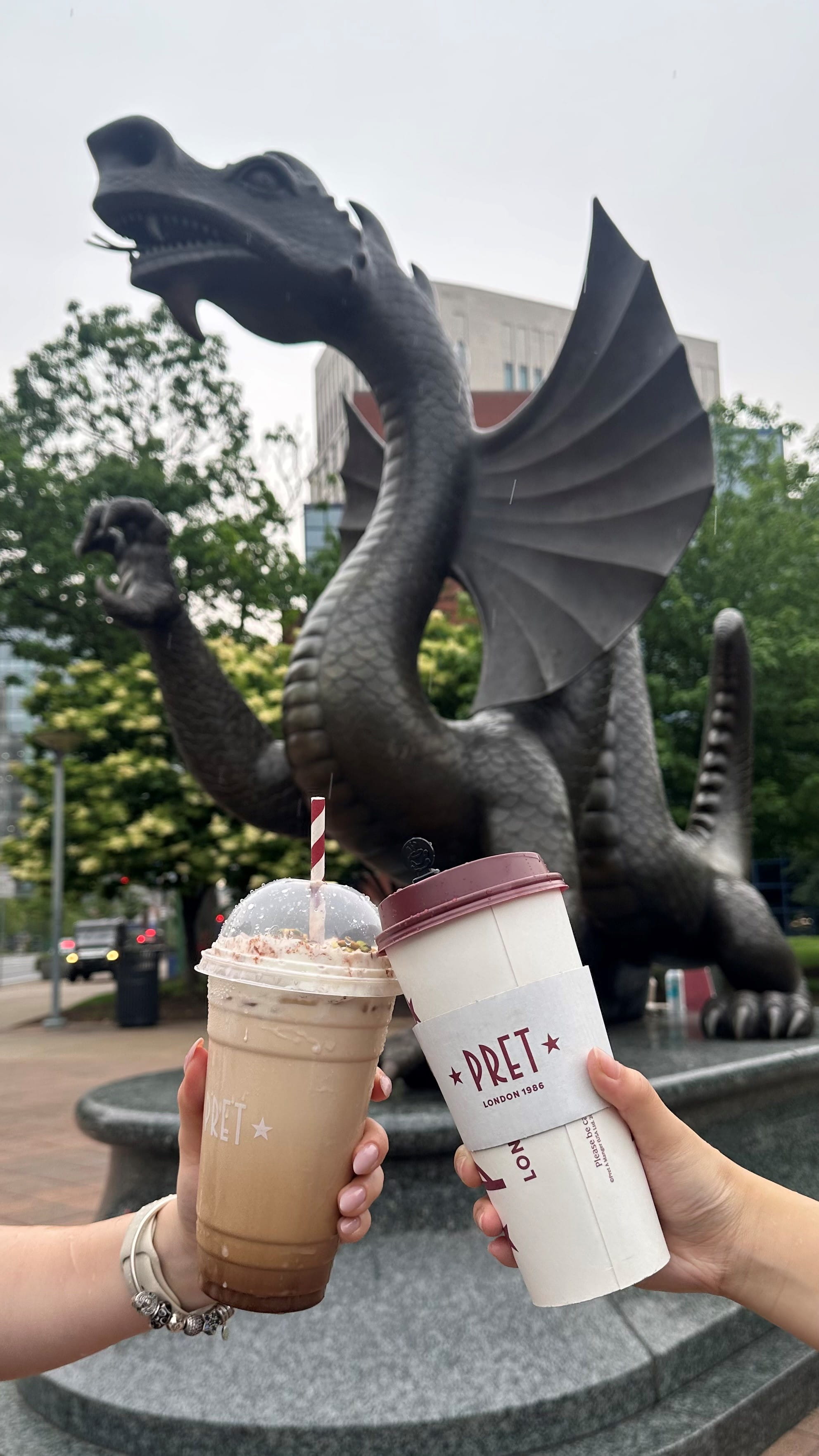 Students cheers with Pret a Manger lattes