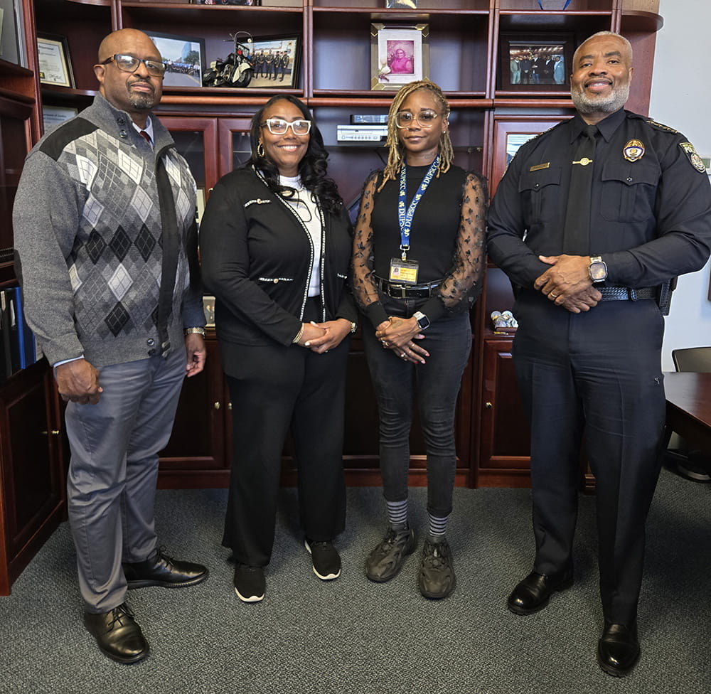 From left to right: Deputy Chief Adam, Communication Director Bailey, Dispatch Trainee Fox and Public Safety VP and Chief of Police Mel Singleton Jr.