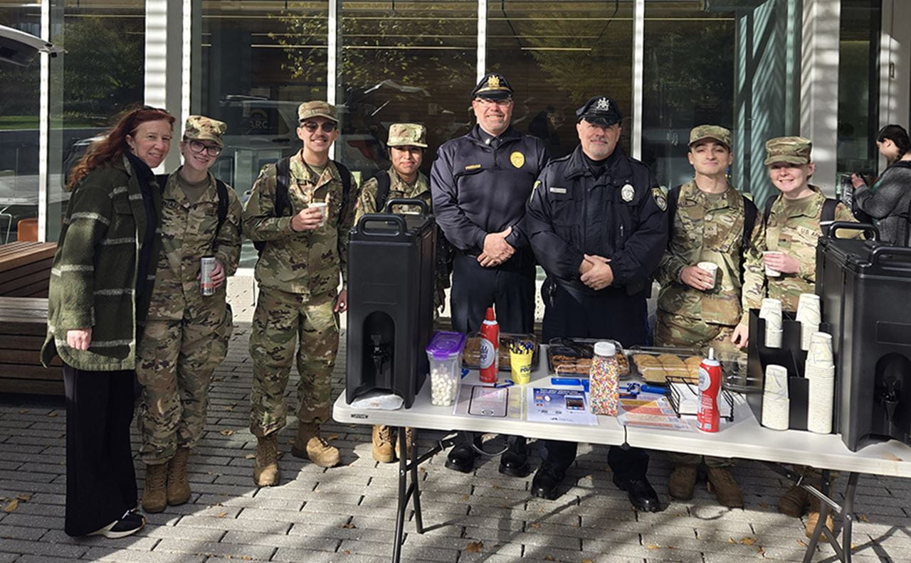 ROTC students and Drexel police officers at a table.