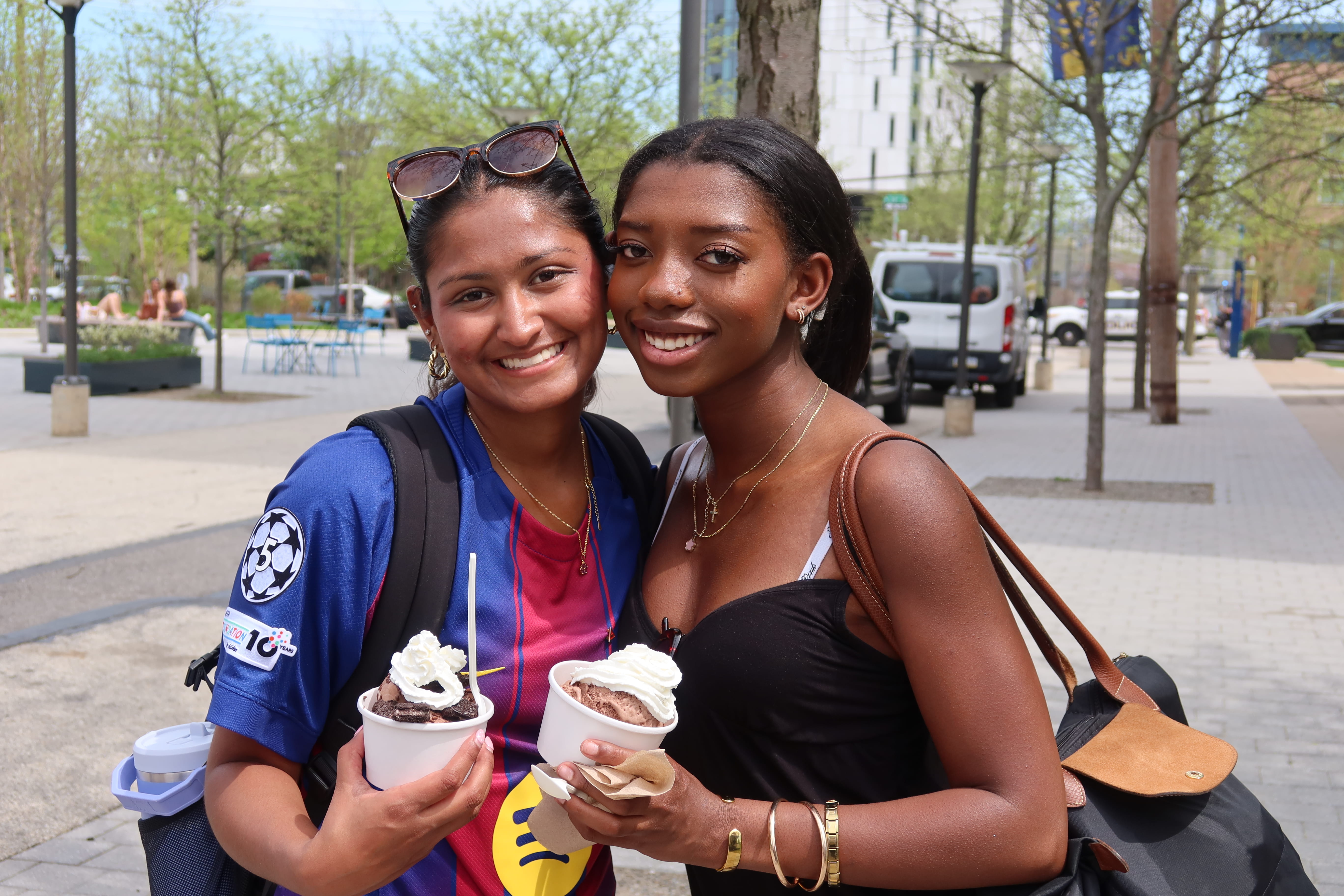Two students with ice cream at social