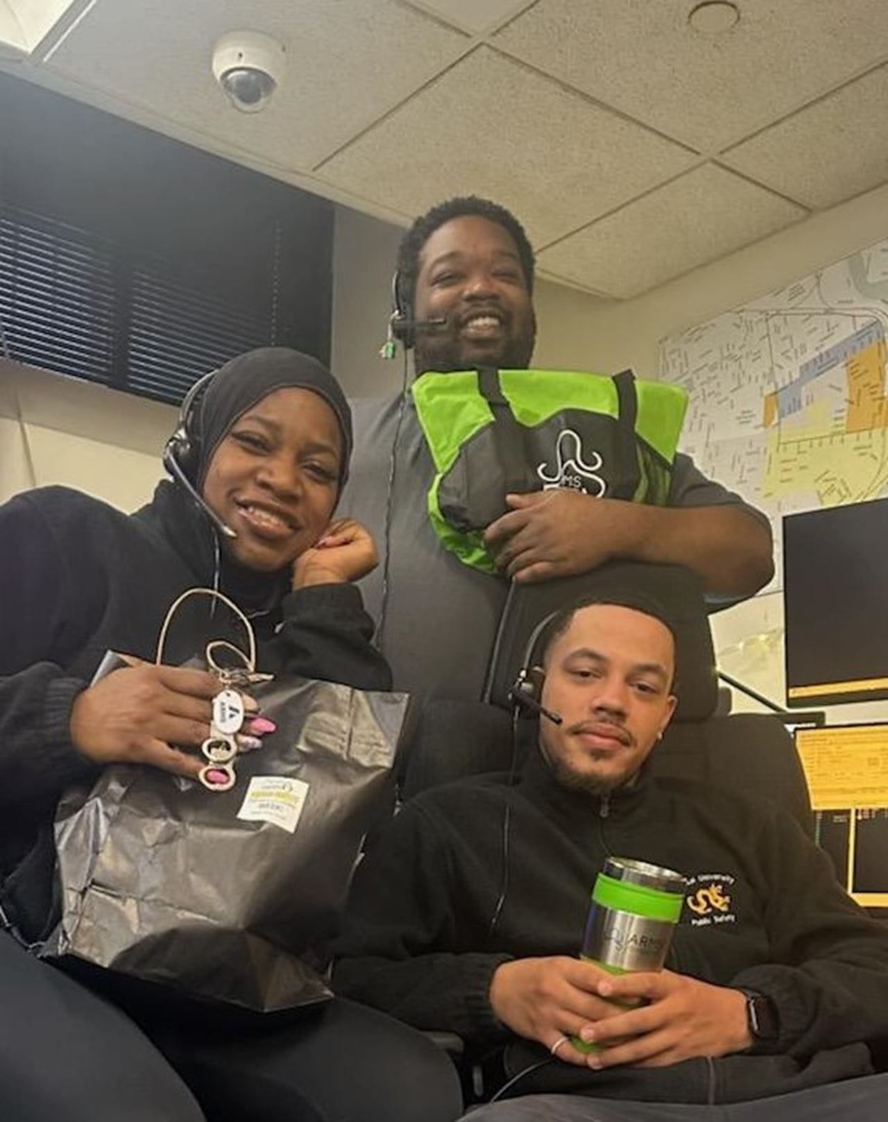 Dispatch Supervisor Jocelyn Bowie, Dispatcher Isiah Dixon (center), Dispatcher Joseph Porter