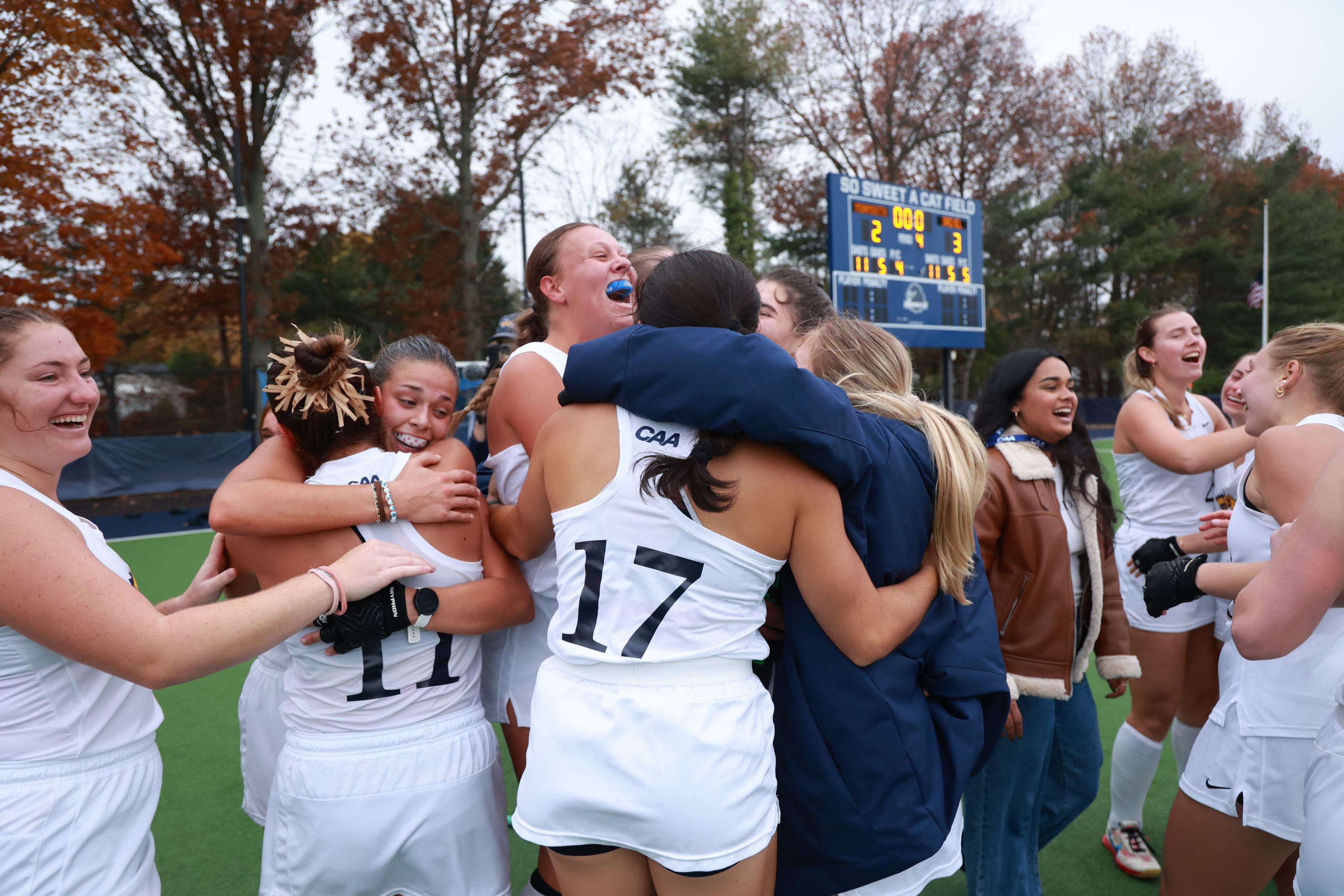 Field hockey teammates celebrate during the CAA championship