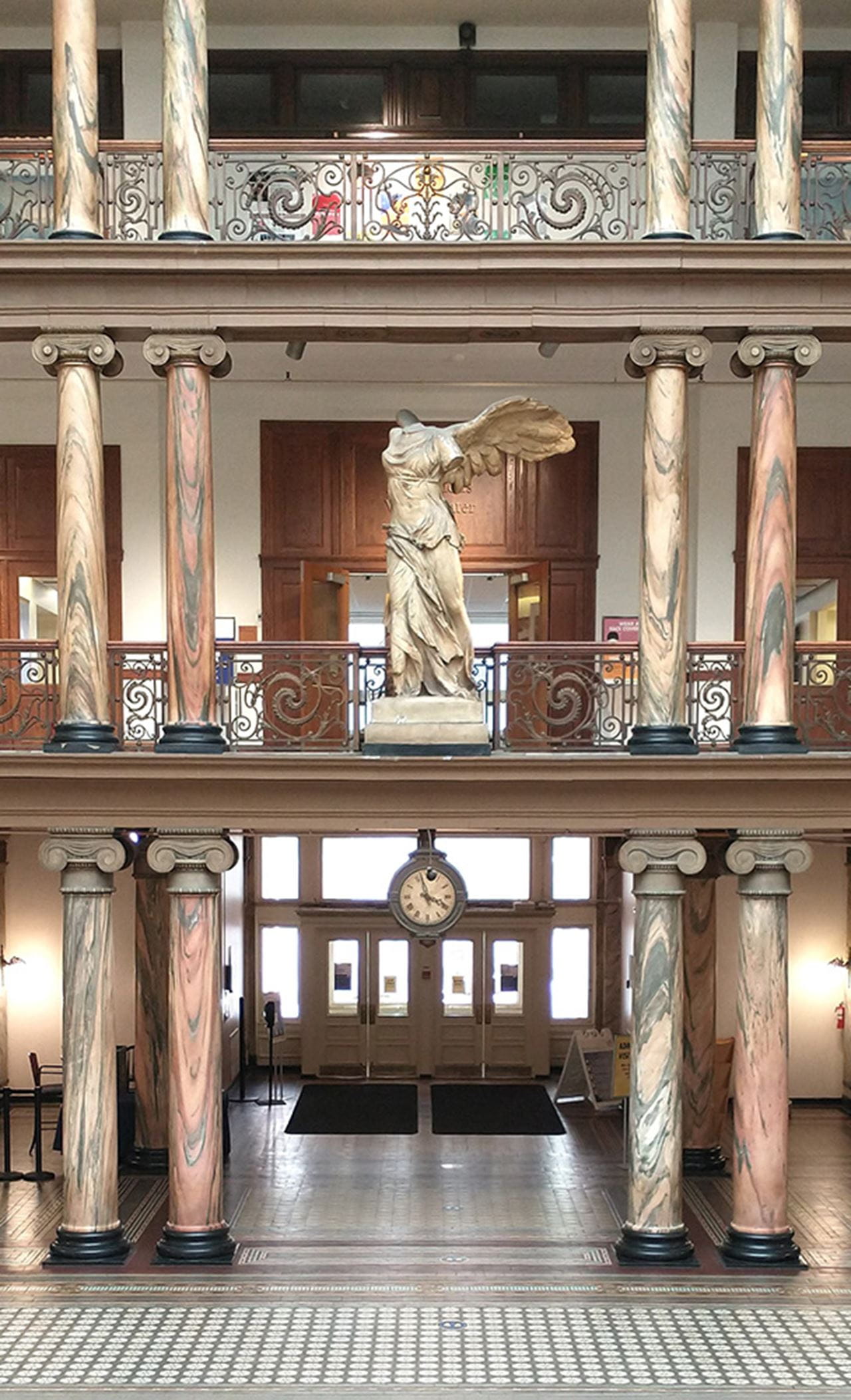 Nike of Samothrace statue, which looks out over the Drexel Main Building's Great Court.