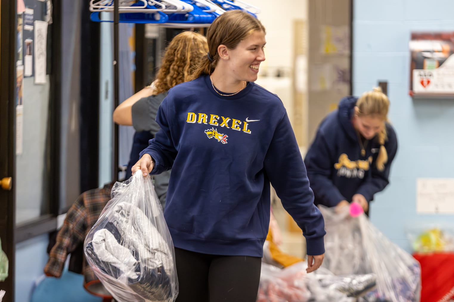 Student sorting donations