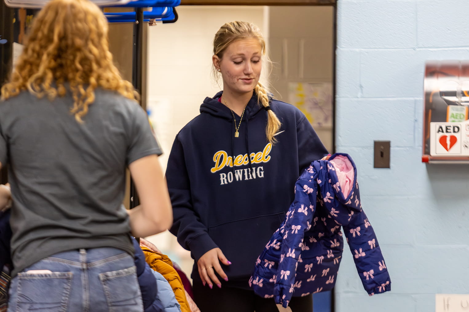 A student sorts donations