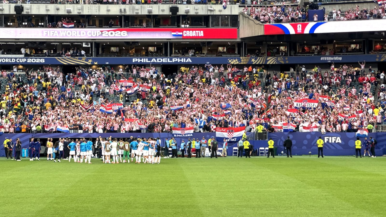 Pictured here is the Croatian team celebrating with their supporters after their 2–1 win over Ghana on June 27 at Philadelphia’s Lincoln Financial Field, which earned them a spot in the World Cup knockout round. 