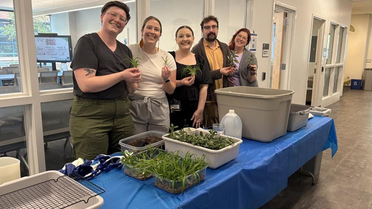 ARC staff with plants