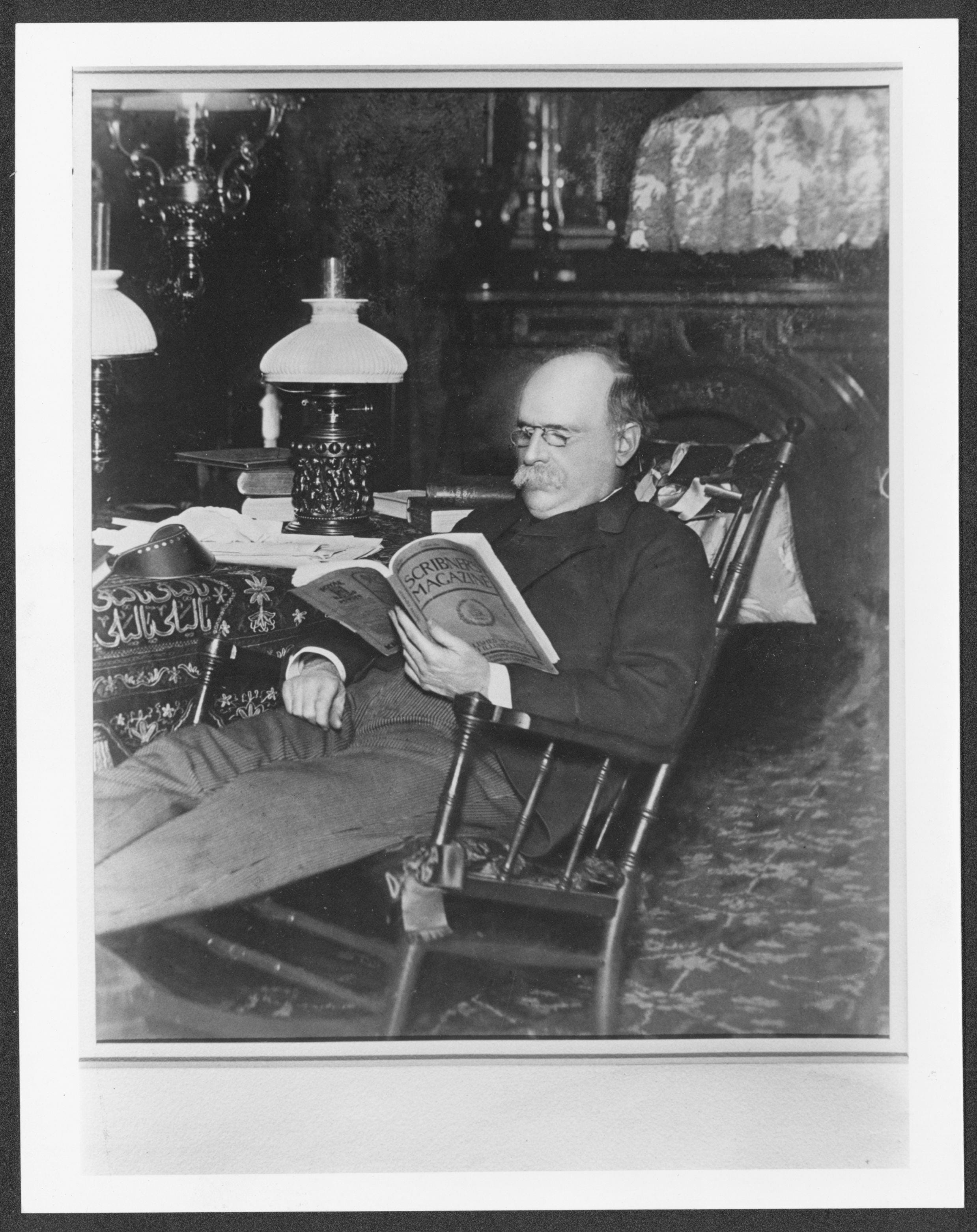 One of the few photographs of Anthony J. Drexel shows him reading an issue of Scribner’s Magazine, an American magazine. 