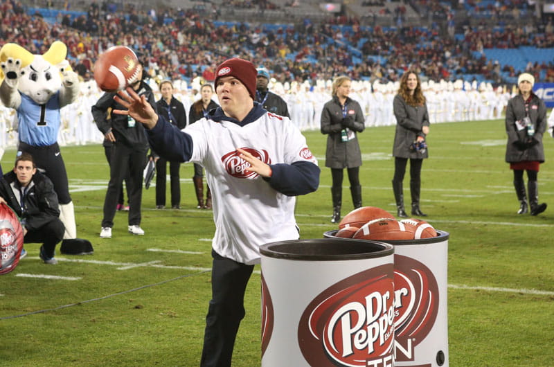 Grad student Michael Dodds throws for the win in the Dr Pepper Tuition Giveaway contest. Photo credit: Dr Pepper.
