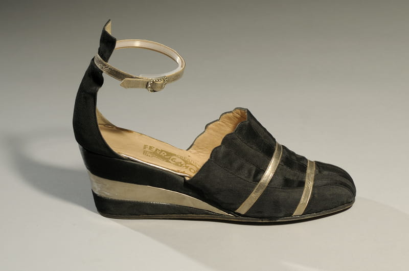 Evening wedge by Salvatore Ferragamo, black silk ottoman and satin with silver kid, circa 1940, Italy. Gift of Mrs. Robert G. McKay.