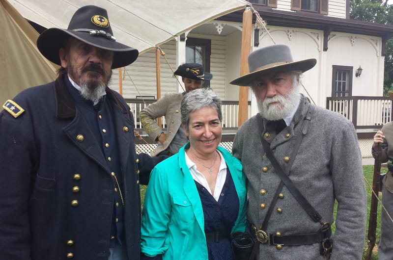 Drexel's Tobie Hoffman, center, with re-enactors playing the Union's General George Meade, left, and the Confederacy's Robert E. Lee, right.